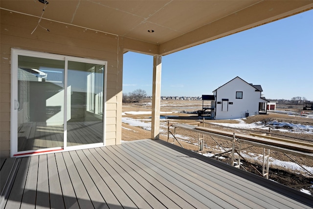 view of snow covered deck