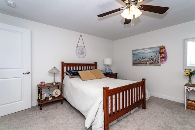 490 Bella Vista Ct, Huxley, IA 50124 - carpeted bedroom with baseboards and a ceiling fan