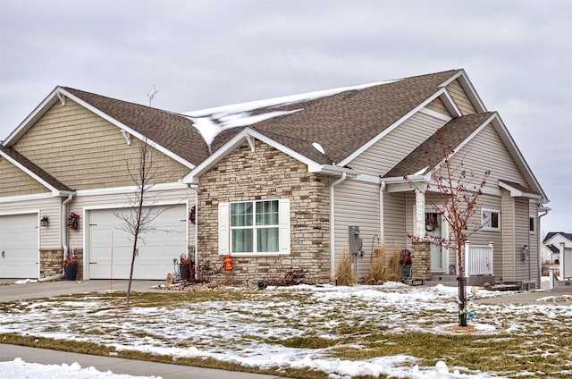 craftsman-style home featuring a garage