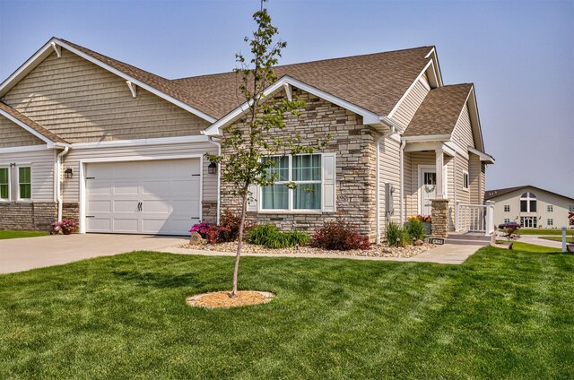 490 Bella Vista Ct, Huxley, IA 50124 - craftsman-style home featuring stone siding, a shingled roof, driveway, and a garage
