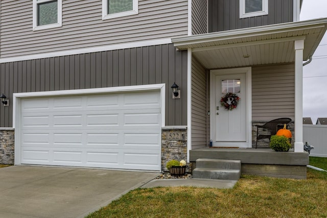 entrance to property featuring a garage