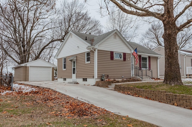 view of front of house with an outbuilding and a garage