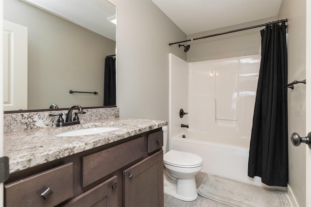 full bathroom featuring shower / tub combo, vanity, and toilet