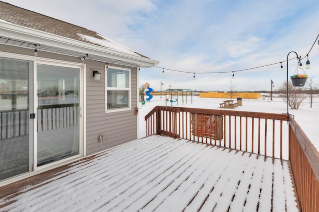 view of snow covered deck