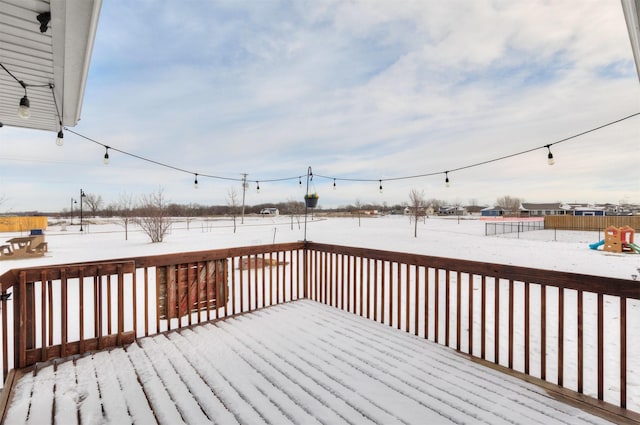 view of snow covered deck