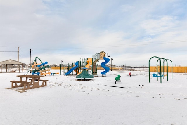 view of snow covered playground