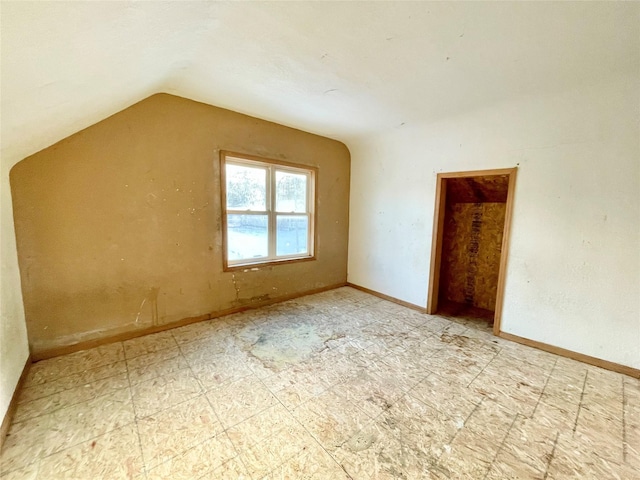 additional living space with lofted ceiling