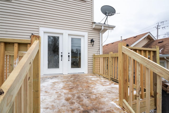 exterior space featuring a deck and french doors