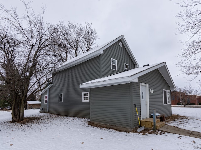 view of snow covered property