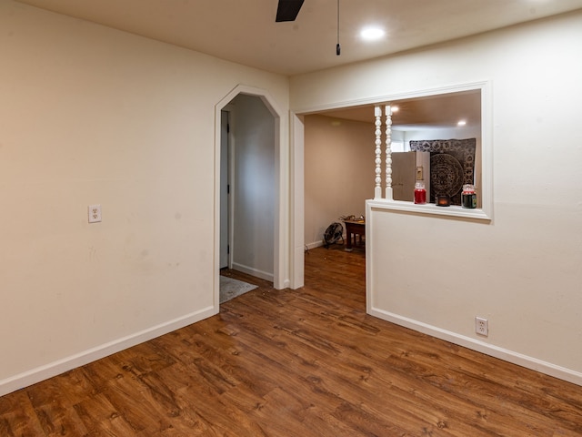 spare room featuring ceiling fan and wood-type flooring