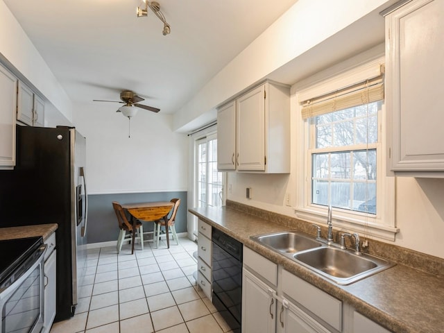 kitchen featuring white cabinets, range with electric cooktop, sink, ceiling fan, and black dishwasher