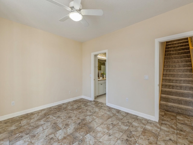 spare room featuring ceiling fan