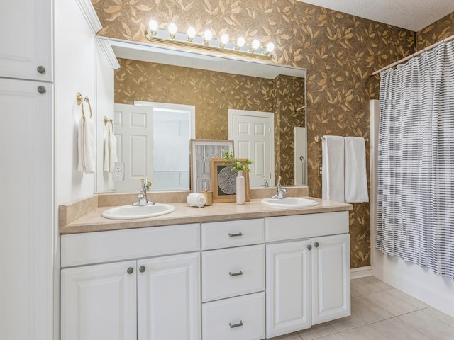 bathroom with tile patterned flooring, vanity, and shower / bath combination with curtain