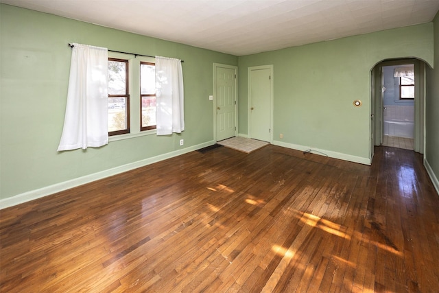 empty room featuring hardwood / wood-style flooring