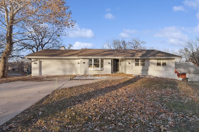 single story home with a garage