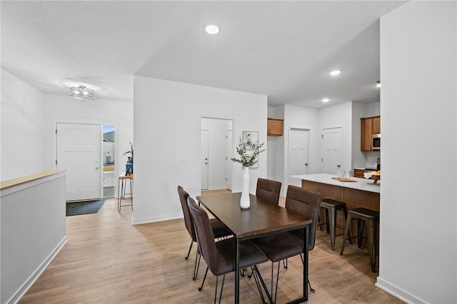 dining room featuring light wood-type flooring