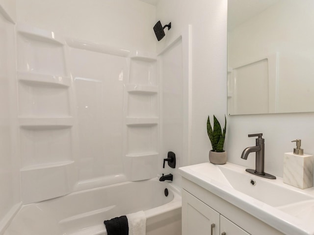 bathroom with vanity and  shower combination