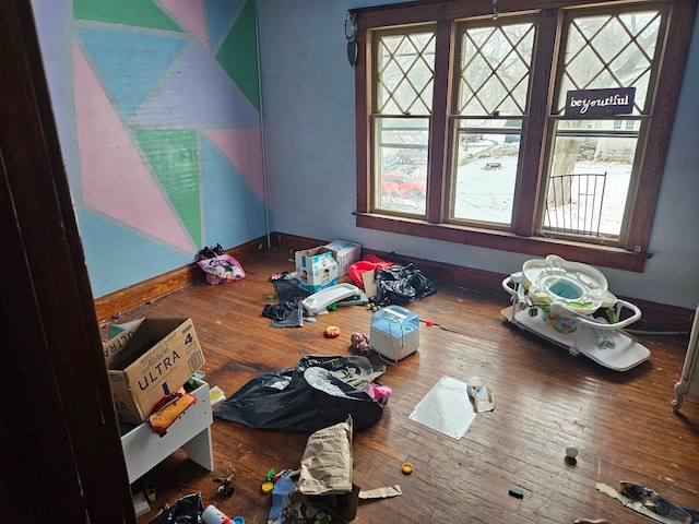 bonus room with hardwood / wood-style flooring