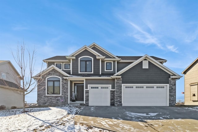 craftsman-style home with a garage