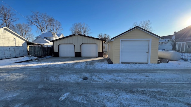 view of snow covered garage