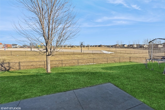 view of yard with a trampoline