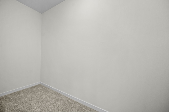 empty room featuring carpet flooring