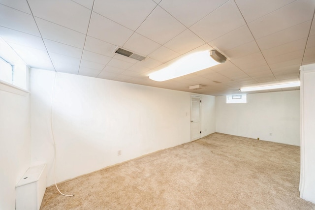 basement with light carpet