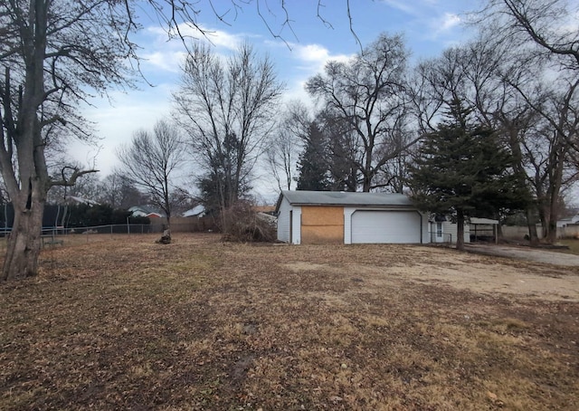 view of yard with a garage