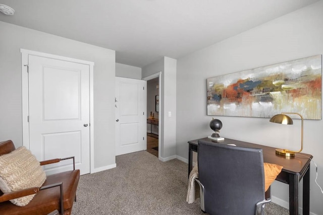 office area featuring carpet and baseboards