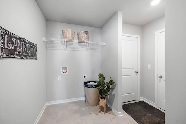 laundry room with laundry area, hookup for a washing machine, electric dryer hookup, and baseboards