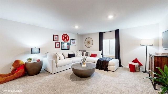 carpeted living room with recessed lighting