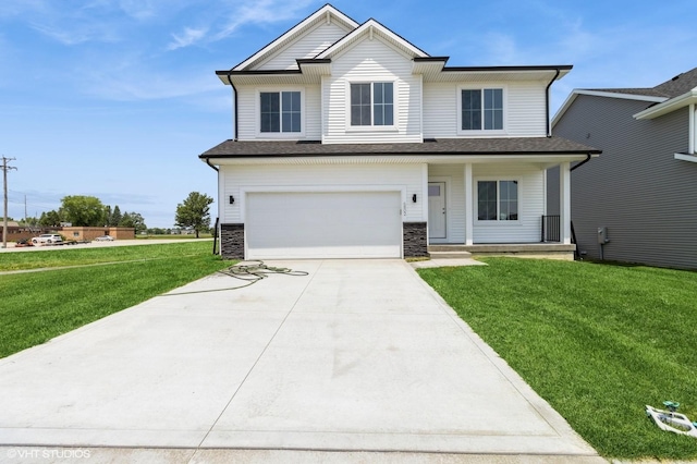 6802 SE 7th Ave, Pleasant Hill, IA 50327 - view of front of house with concrete driveway, a front yard, covered porch, and a garage