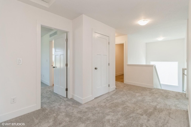 6918 SE 7th Ave, Pleasant Hill, IA 50327 - carpeted spare room featuring baseboards