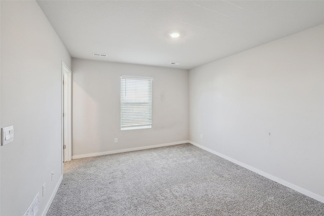 view of carpeted spare room