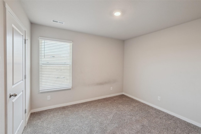 view of carpeted spare room