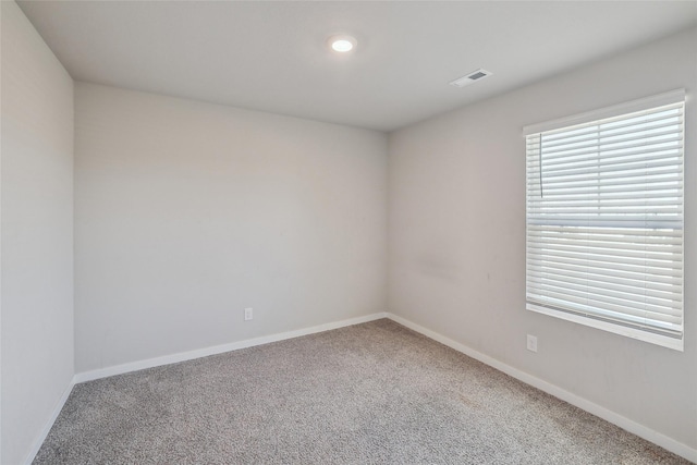 view of carpeted spare room