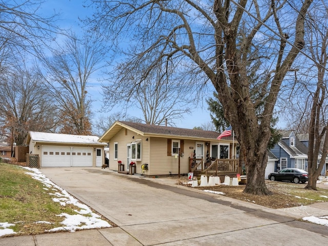 ranch-style house with covered porch and a garage