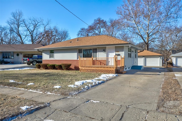 single story home with a garage and a front lawn