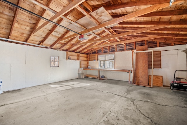 garage featuring a garage door opener