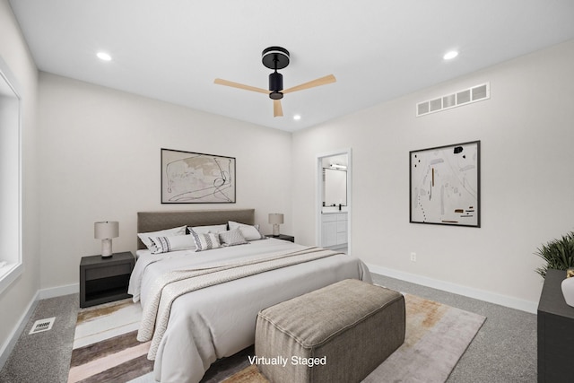 carpeted bedroom featuring recessed lighting, visible vents, and baseboards