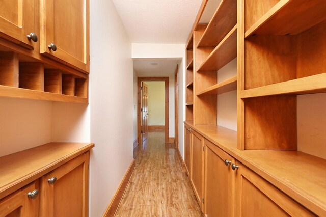 hall featuring light hardwood / wood-style flooring