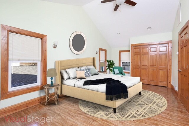 bedroom with high vaulted ceiling, ceiling fan, and light wood-type flooring