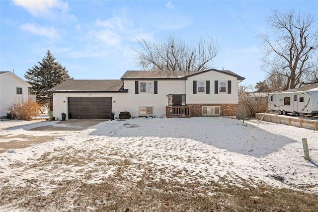 split foyer home featuring a garage