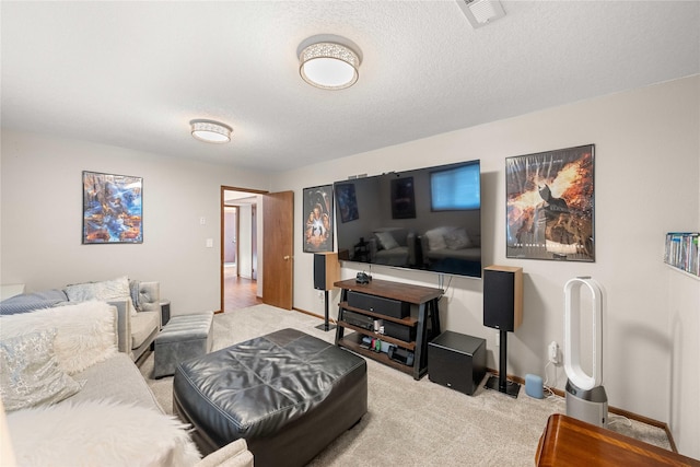 living room with a textured ceiling and light carpet