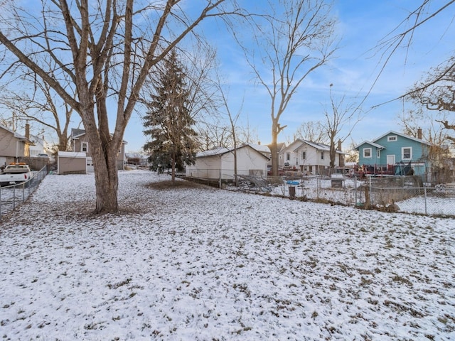 view of yard covered in snow