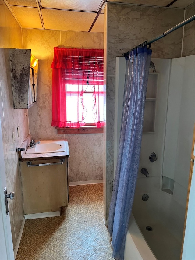 bathroom with shower / tub combo with curtain and vanity