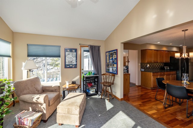 living room with lofted ceiling and dark hardwood / wood-style floors