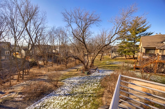 view of yard with a wooden deck