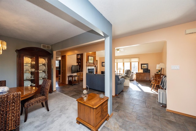 interior space featuring ceiling fan