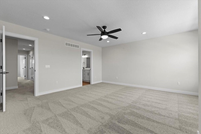 1991 S Warrior Ln, Waukee, IA 50263 - unfurnished bedroom featuring carpet flooring, recessed lighting, baseboards, and a ceiling fan